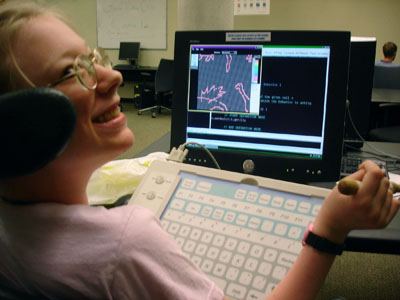 pals11p11.jpg A high school student uses assistive technology with her laptop.